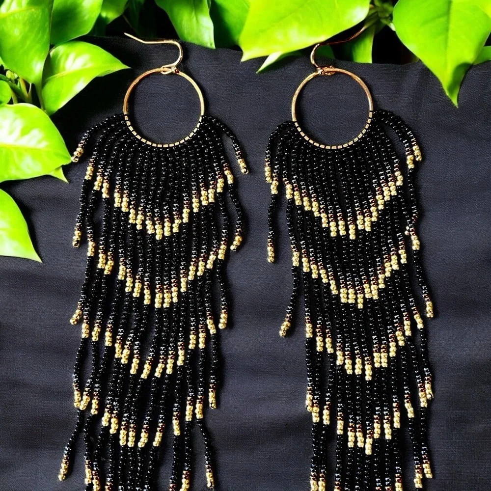 Black and Gold Glass Beaded Chandelier Earrings with Cascading Feather Design